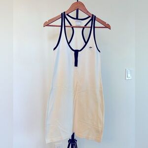 Lacoste Tennis / Golf dress. 94% Cotton. White with black detail.